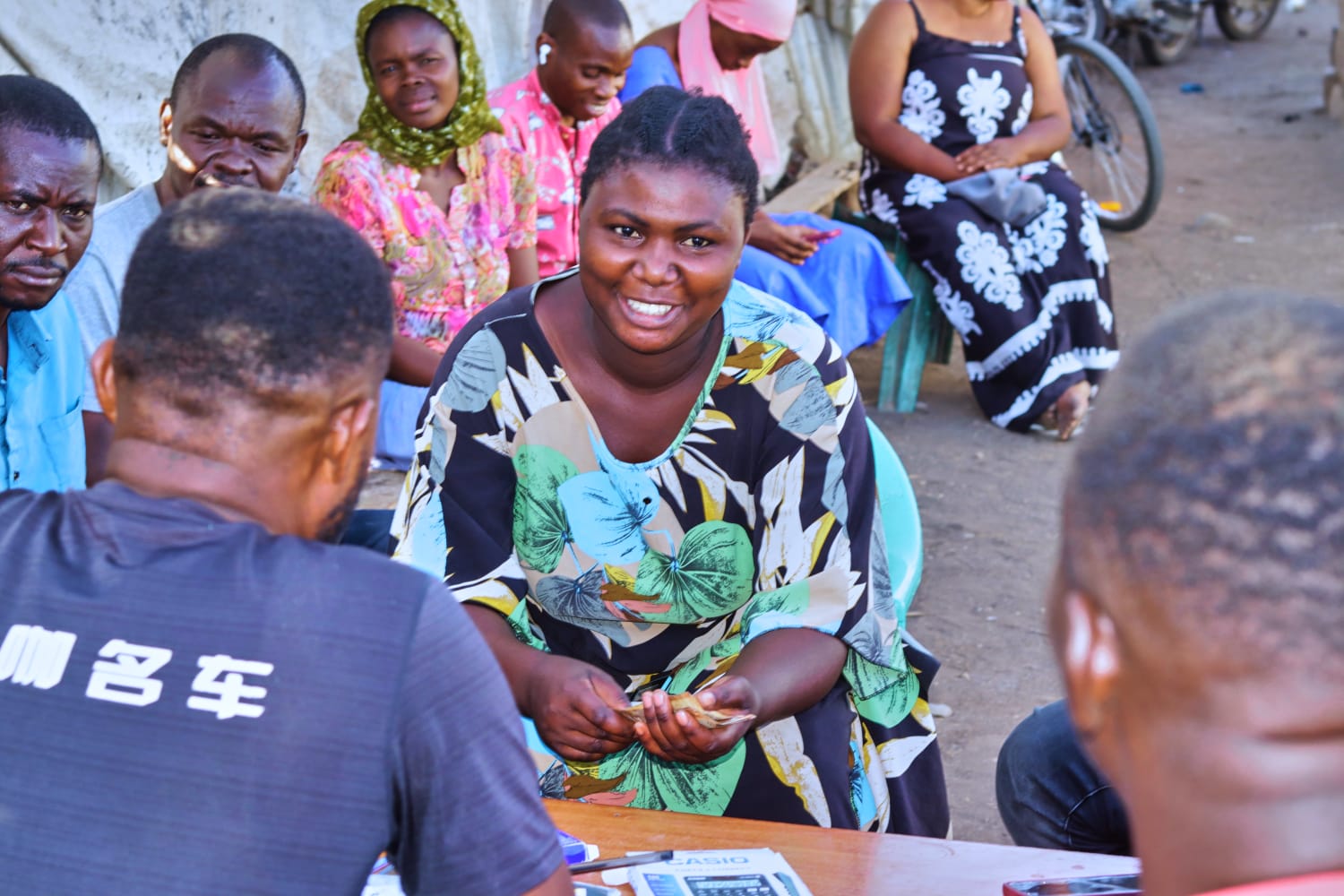 A member smiling during the meeting